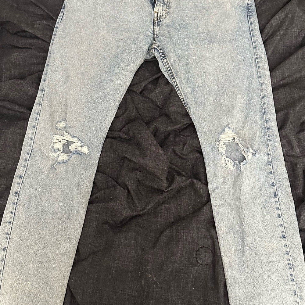 Distressed Light Blue Jeans